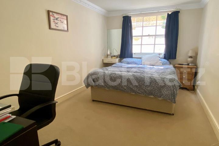 Spacious two bedroomed lower ground garden flat Alderney Street, Victoria / Pimlico
